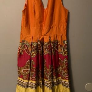 Spense sleeveless, V neck waisted, pleated dress